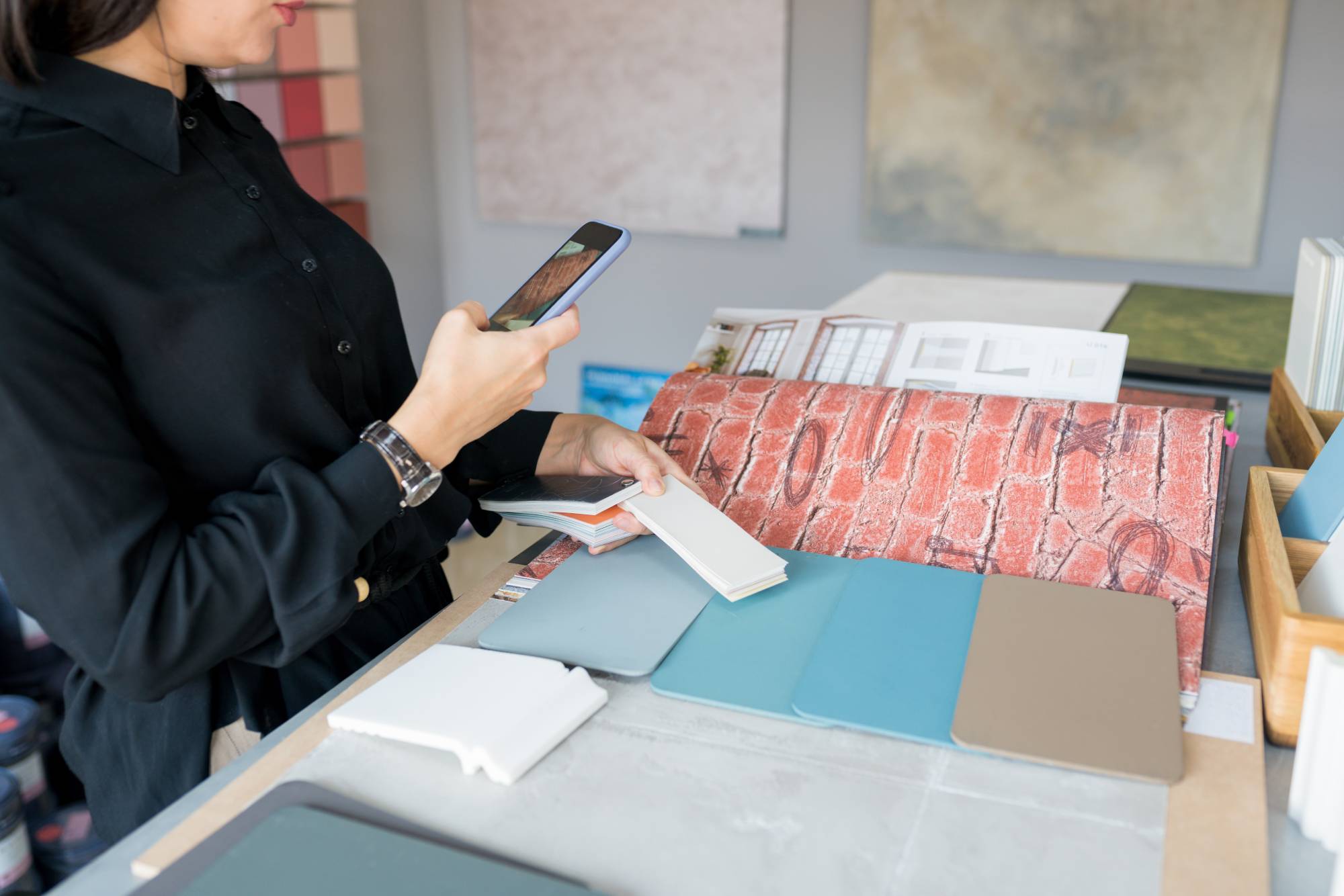 Homeowner reviewing materials with interior designer in Singapore