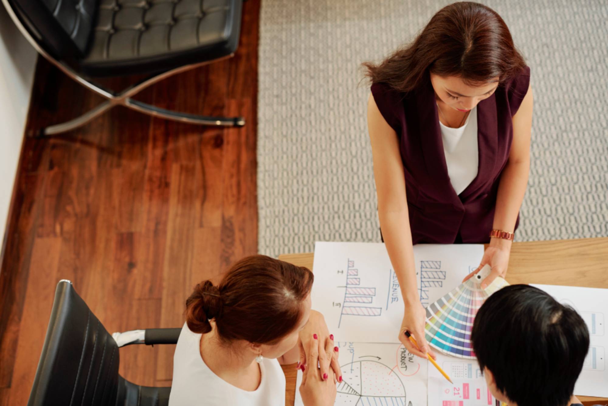 Interior designers discussing colour palette for Singapore home renovation
